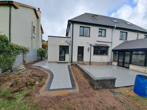 Our patio team installing a patio in Cork City