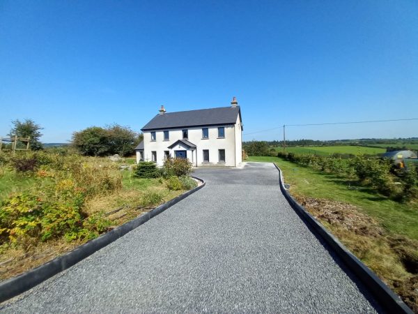 Laying a tar and chip driveway in Passage West